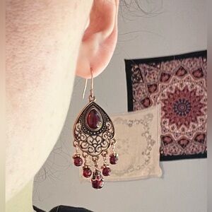 Gold/bronze and red dangly earrings